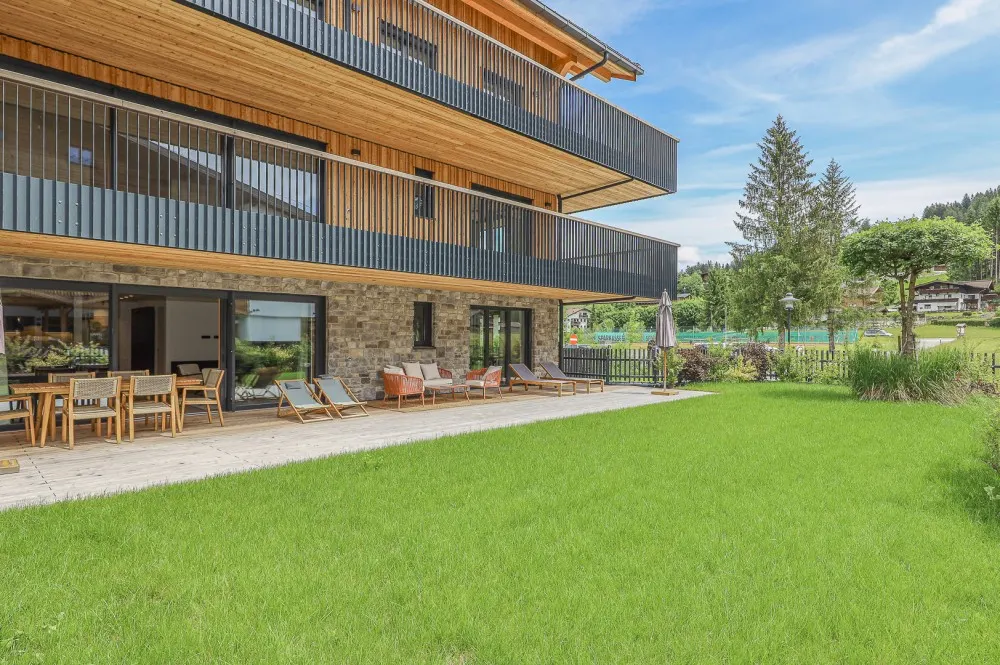 KITZIMMO-Riverside - Luxus-Garden-Suite in Toplage kaufen - Immobilien Kirchberg.