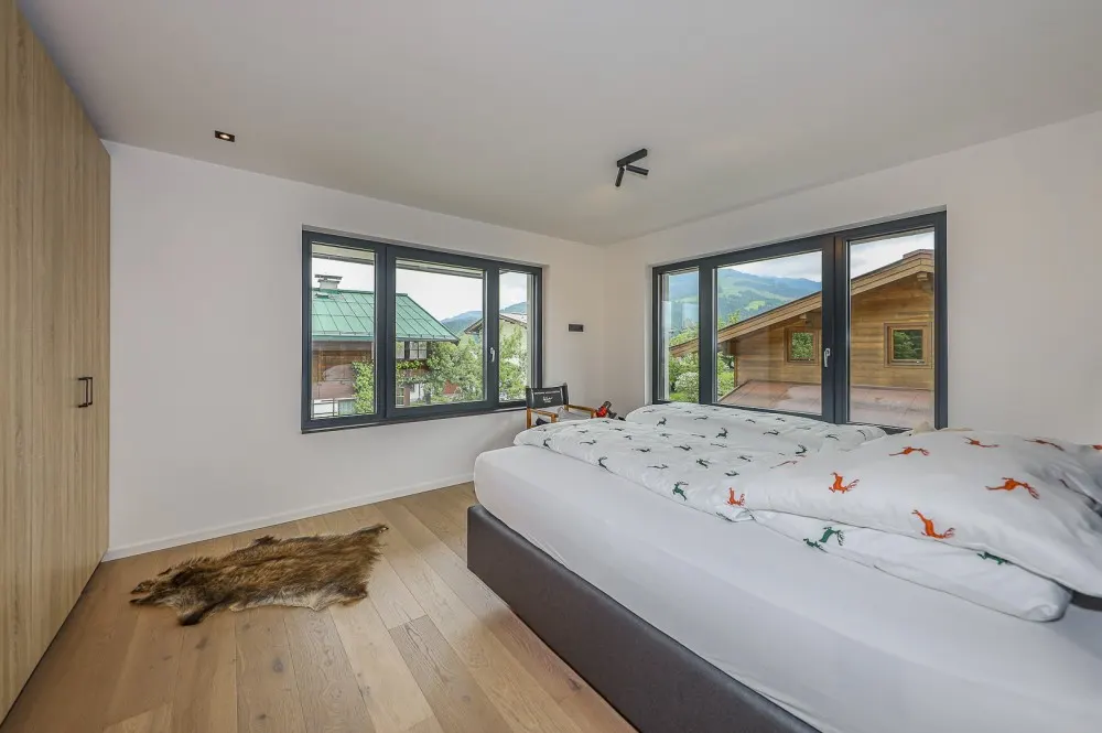 KITZIMMO-Luxus-Penthouse mit Kaiserblick kaufen - Immobilien St. Johann.
