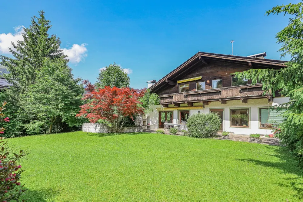 KITZIMMO-Baugrundstück mit Altbestand in Toplage auf der Bichlalm - Immobilien Kitzbühel.-1