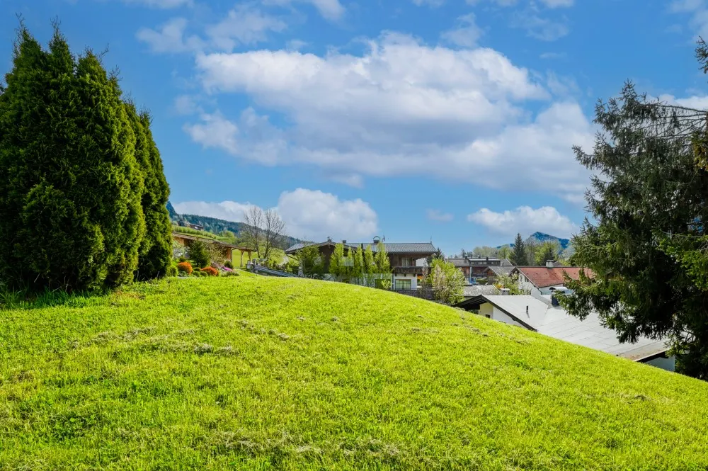 KITZIMMO-Unbebautes Grundstück in sonniger Ruhelage kaufen - Immobilien Ellmau.