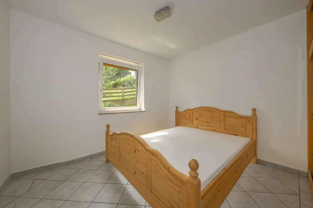 KITZIMMO-Gartenwohnung in Ruhelage kaufen - Immobilien St. Johann.