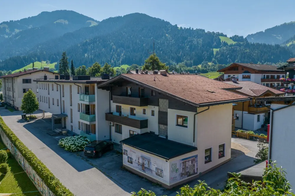 KITZIMMO-Grundstück mit Baugenehmigung für 5 Wohnungen - Immobilien Söll.