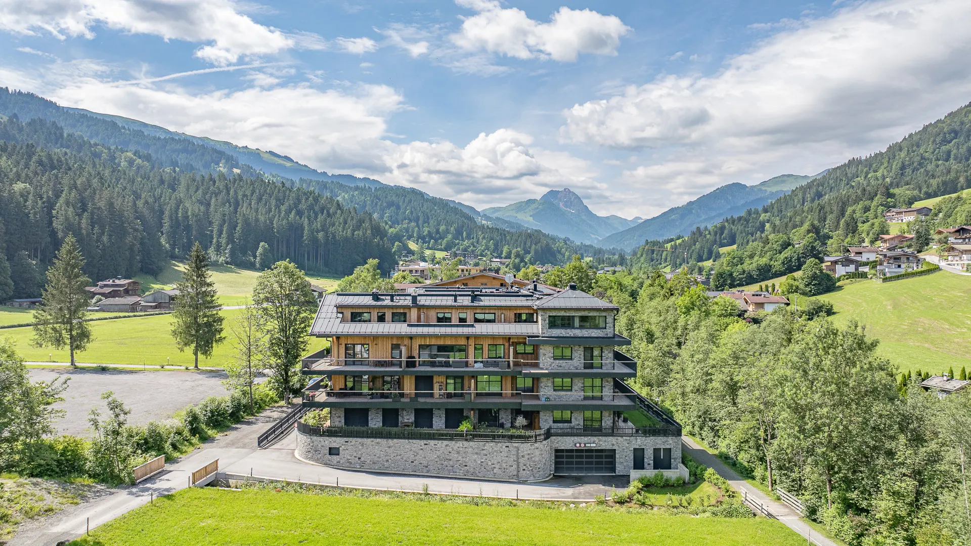 KITZIMMO-Riverside - Luxus-Garden-Suite in Toplage kaufen - Immobilien Kirchberg.