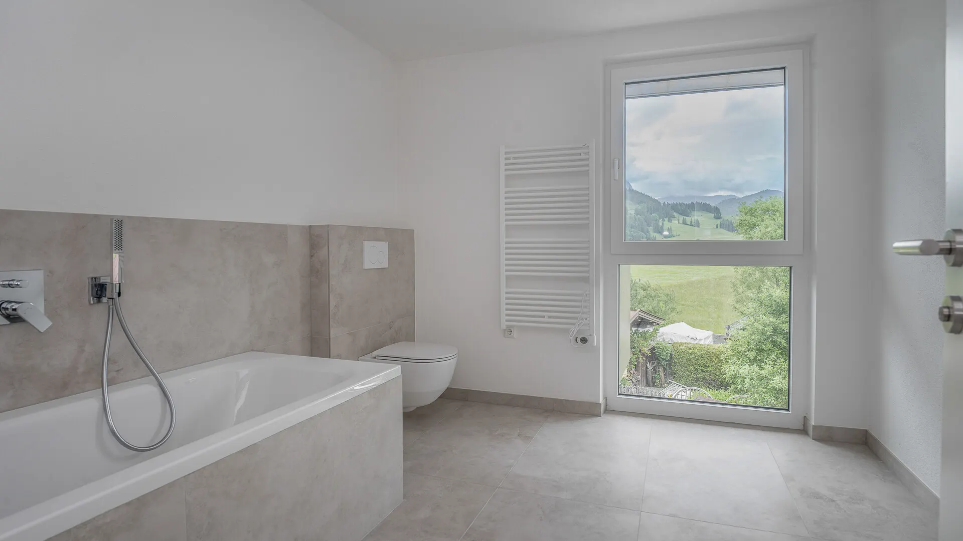 KITZIMMO-Luxuriöses Neubau-Penthouse mit Kaiserblick kaufen - Immobilien Kirchdorf.