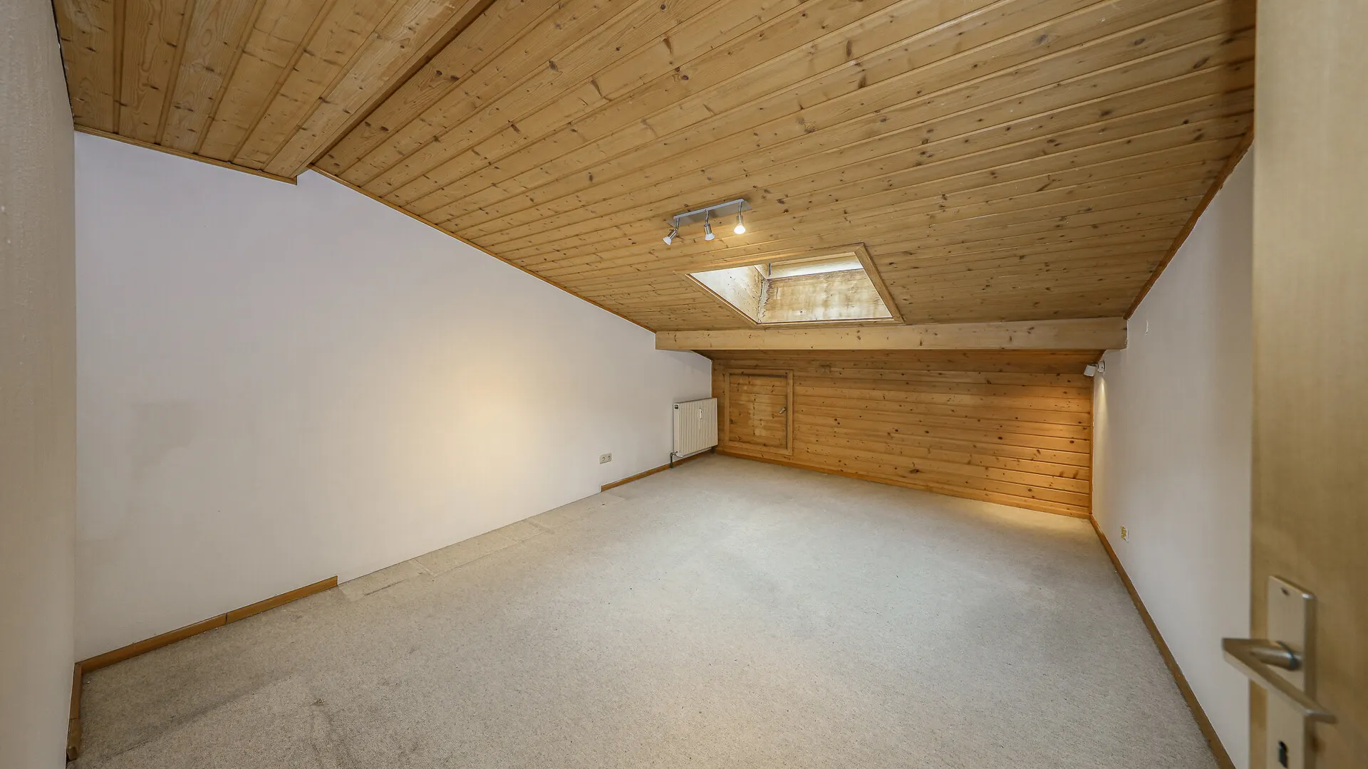 KITZIMMO-Dachgeschosswohnung mit Bergblick kaufen - Immobilien Kitzbühel.