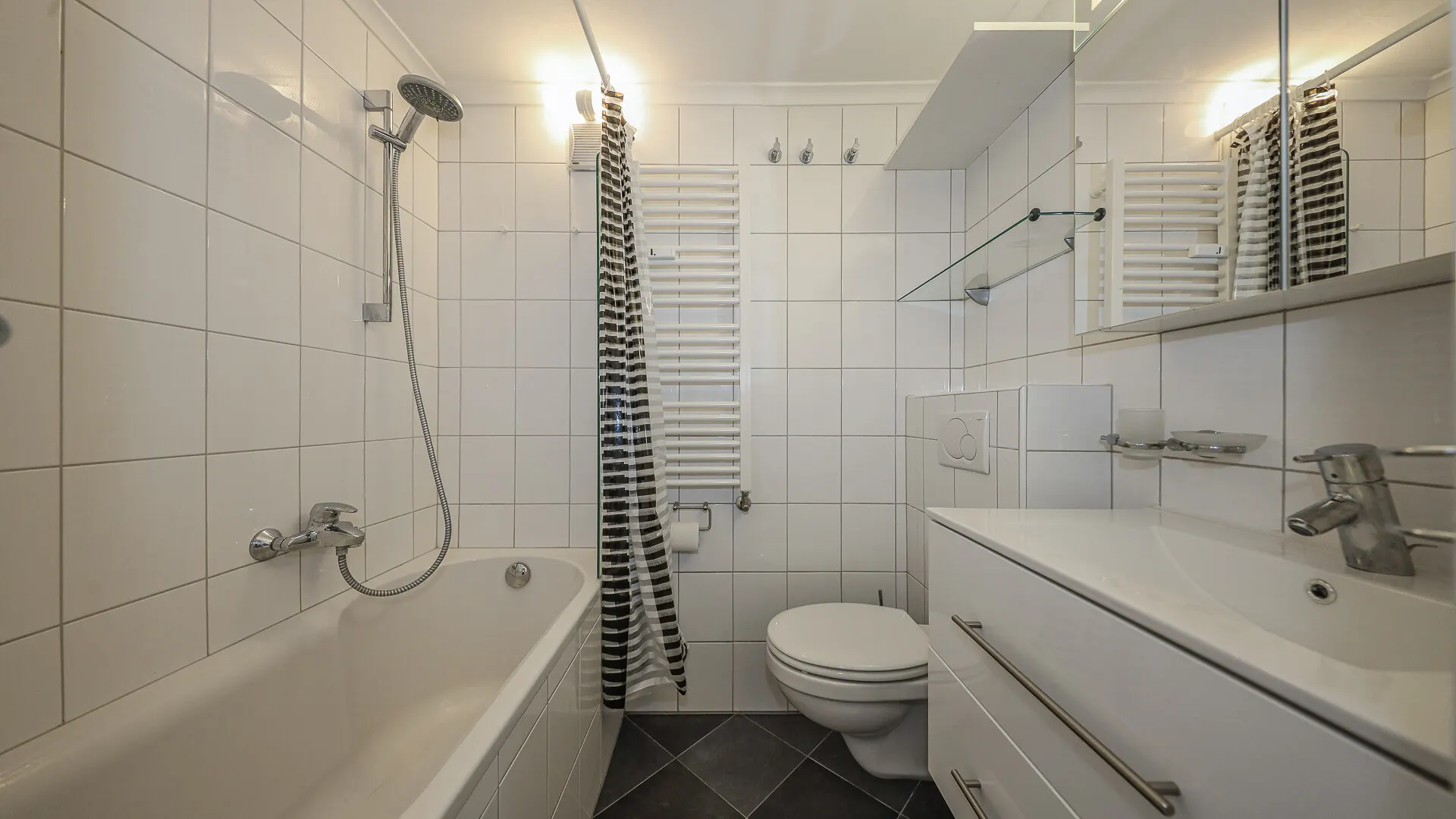 KITZIMMO-Dachgeschosswohnung im Zentrum kaufen - Immobilien Kitzbühel.-11